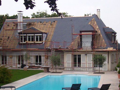 pose de toiture en ardoise sur une maison bourgeoise près de Reims