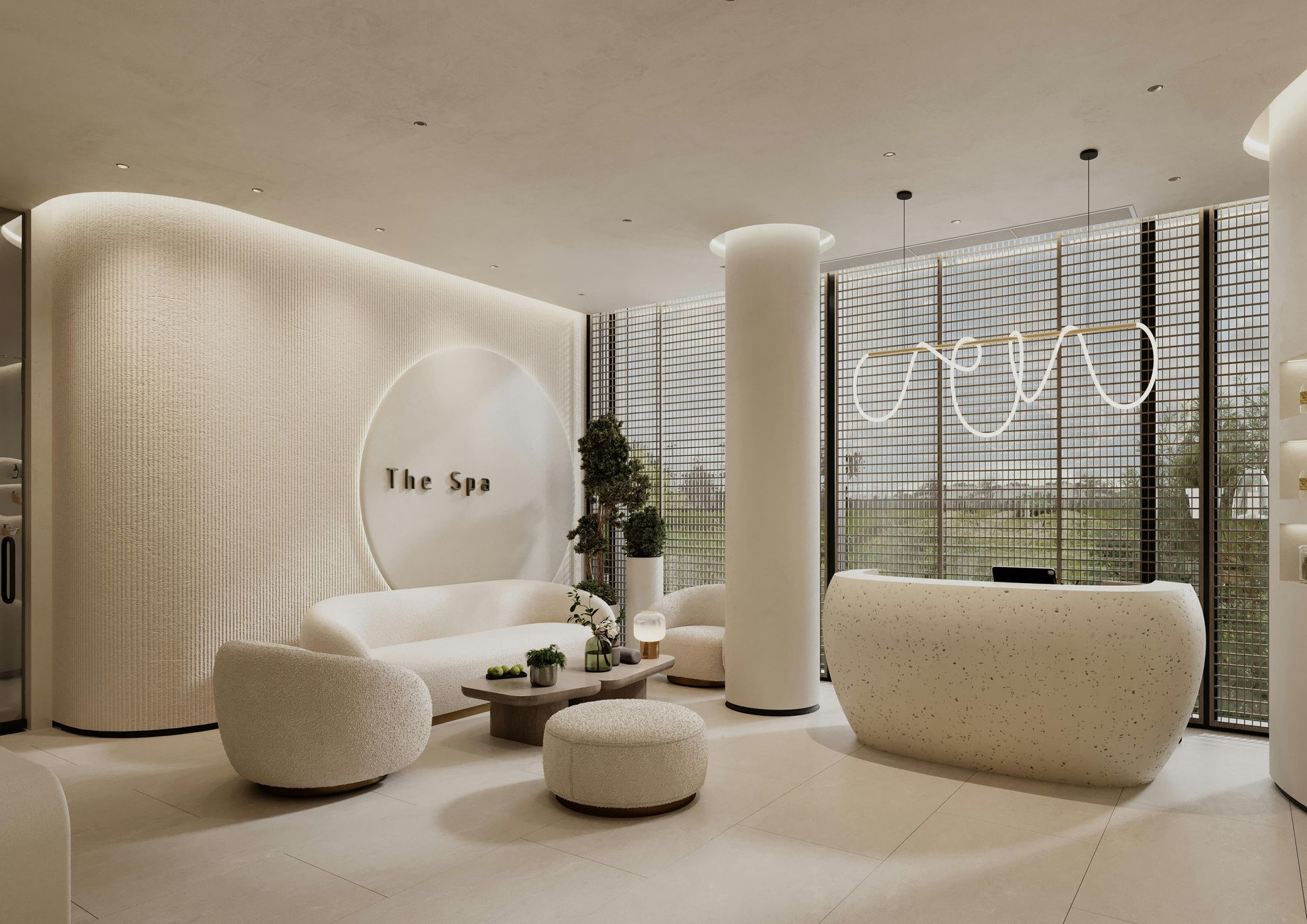 Spa reception area in white with seating, a desk, and the words