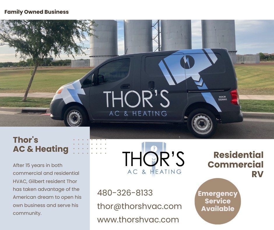 A thor 's ac & heating van is parked on the side of the road