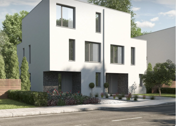 Modern white townhouses with dark entryways and small windows; roadside view.