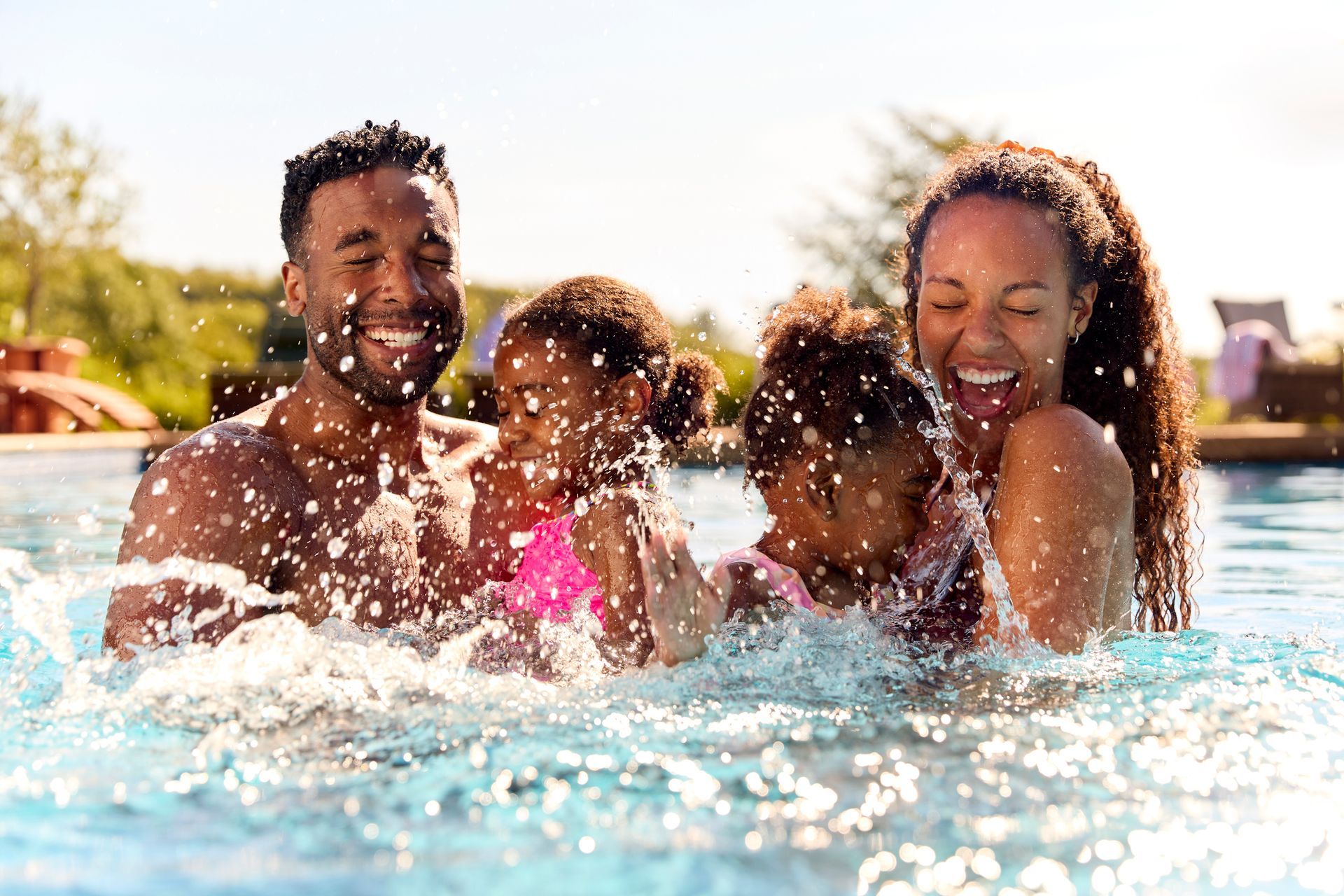 family in pool