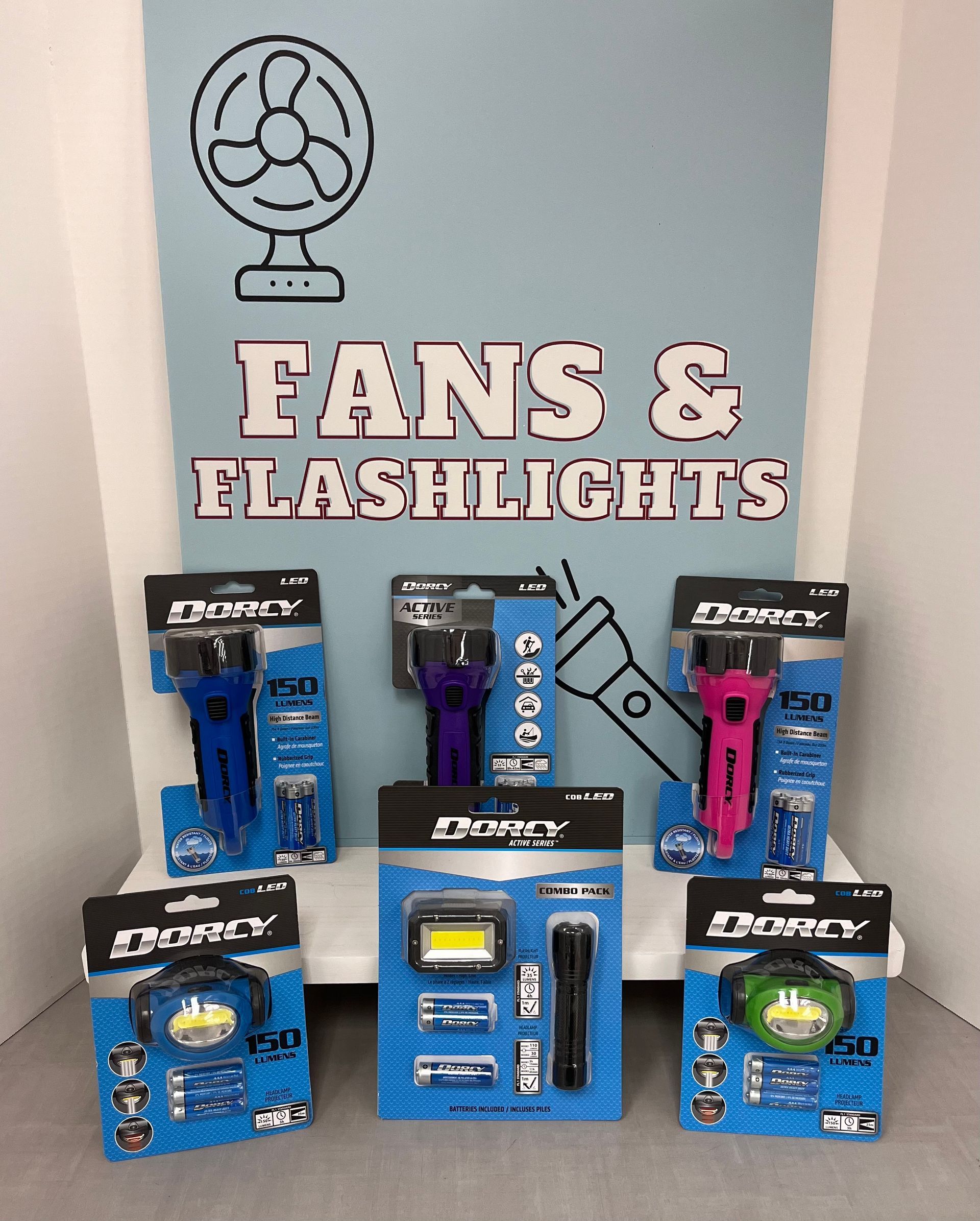 a display of fans and flashlights on a shelf