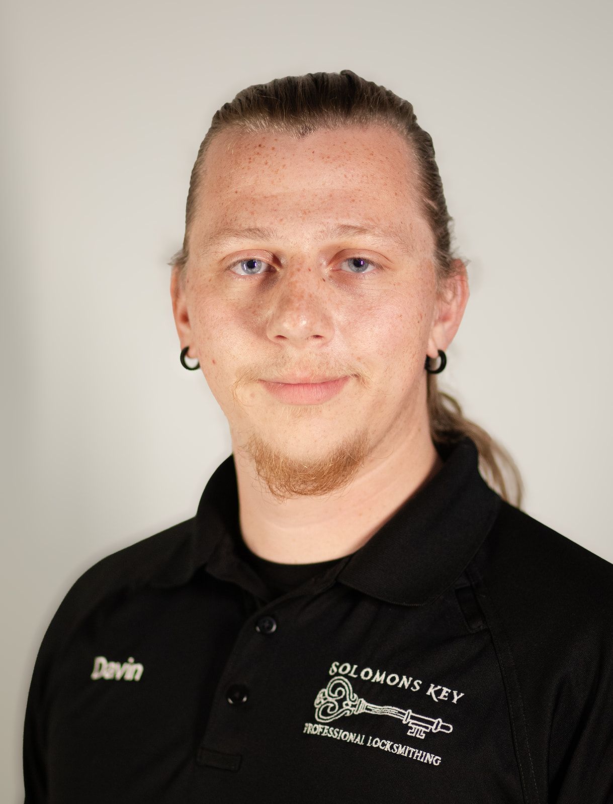 A man wearing a black shirt 