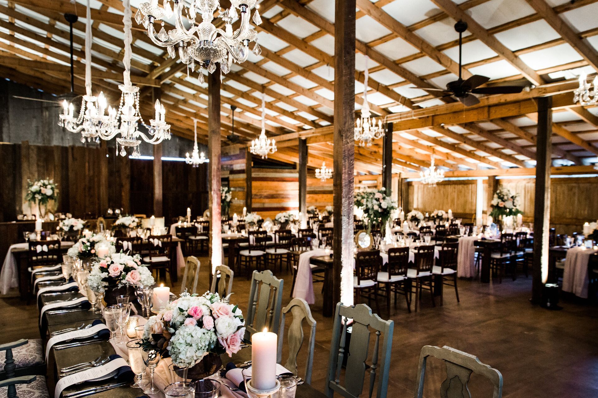 Heather & Ron's Wedding large room with tables and chairs set up for a wedding reception by Wedding Planner Nashville