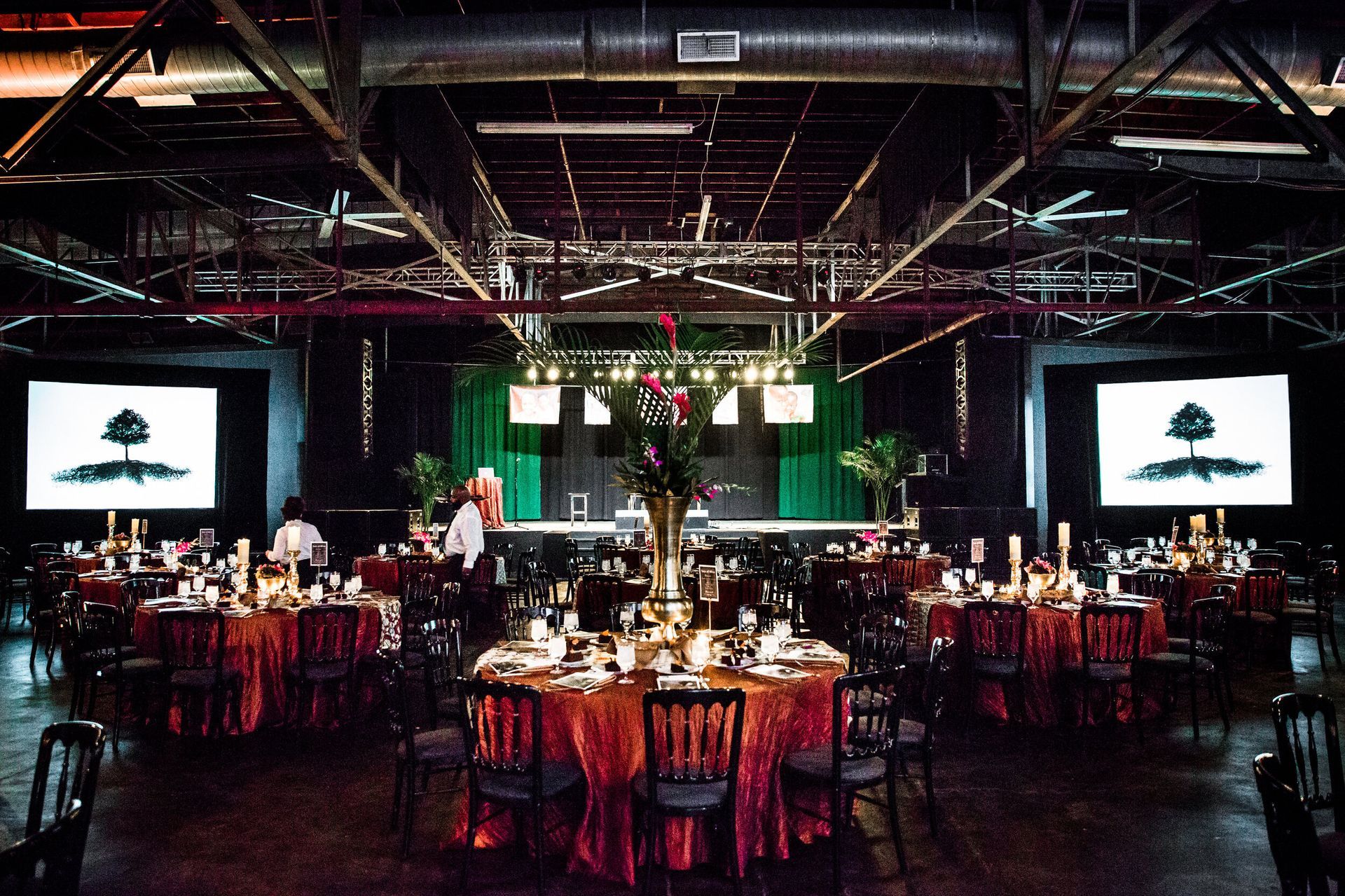 Large room with tables and chairs set up for a party by Events Planner Nashville