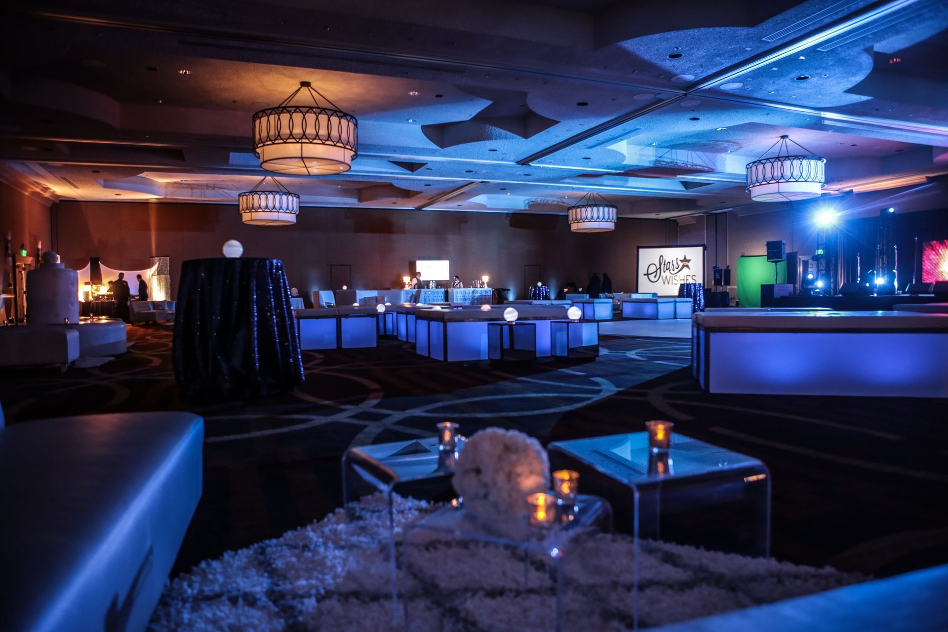 Event room area with a lot of furniture and tables by Events Planner Nashville