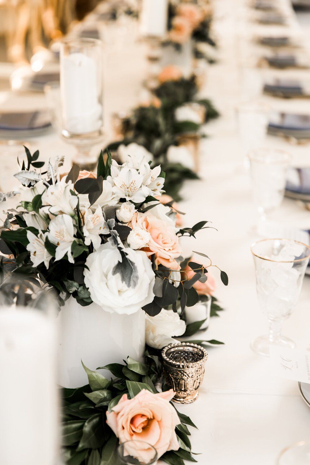 Micro Weddings long table with flowers and candles on it by Wedding Planner Nashville