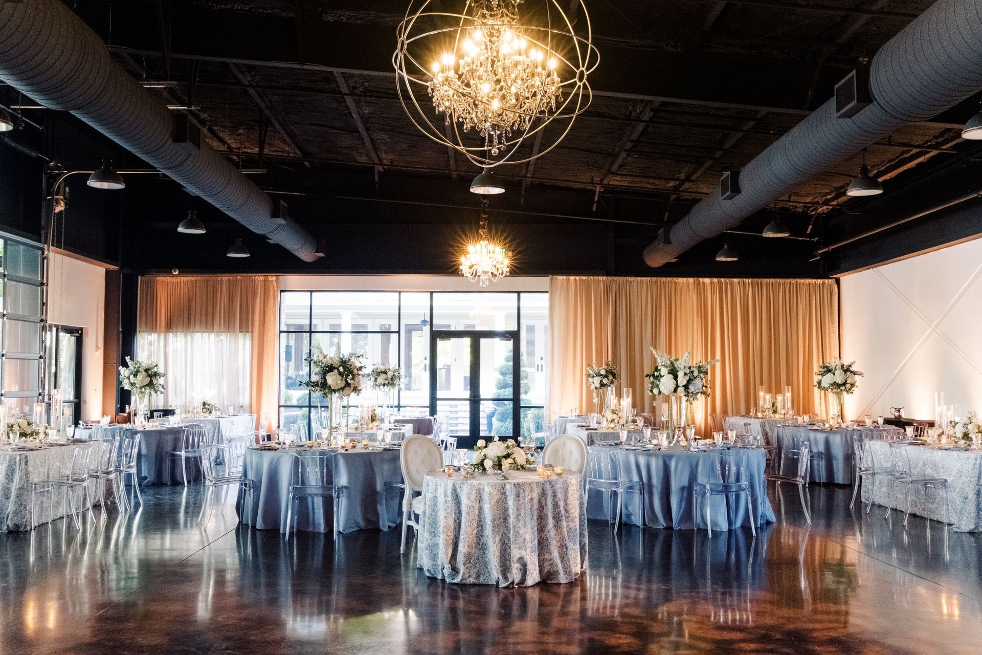 Rachel and Joe’s Wedding, large room with tables and chairs set up for a wedding reception by Wedding Planner Nashville
