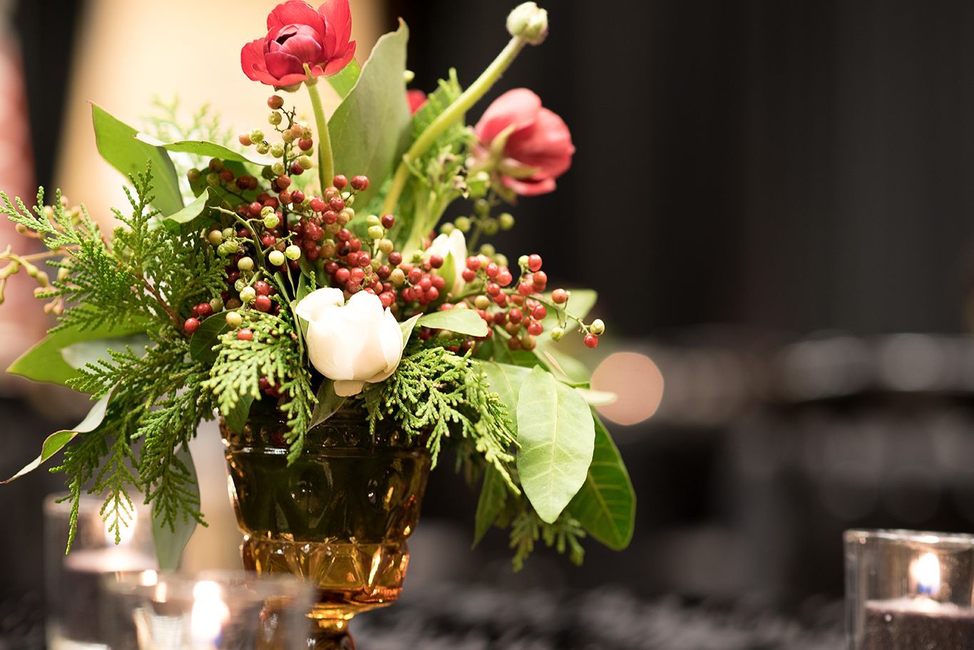 TWESA Snow Ball, vase filled with flowers and candles on a table by Event Planner Nashville