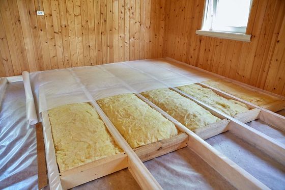 a room with a lot of unfinished wood in it
