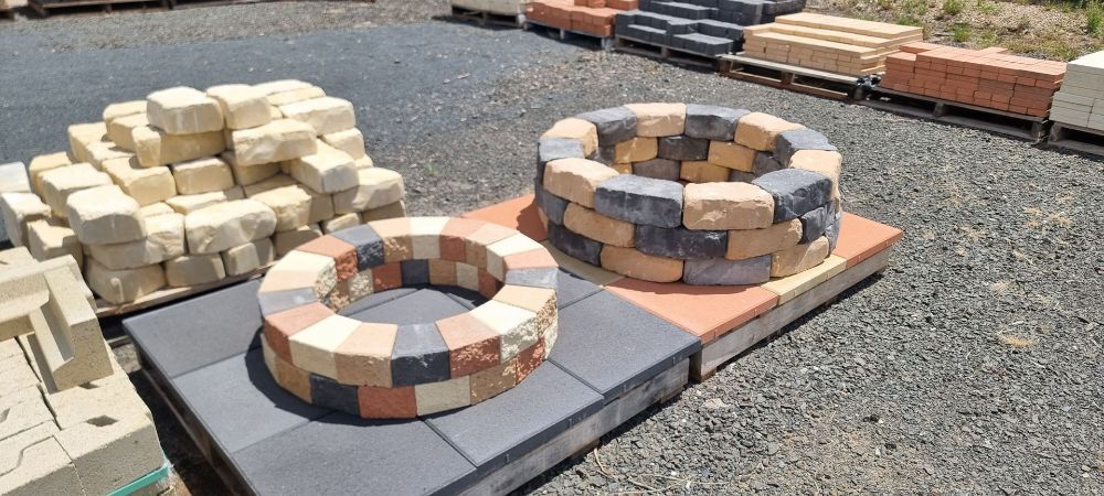 A Fence Surrounds a Parking Lot With a House in the Background — Beehive Property Maintenance in Emerald, QLD