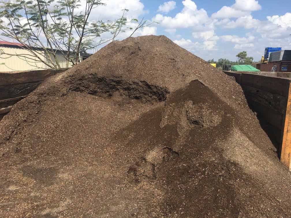 A Pile of Dirt is Sitting on Top of a Truck — Beehive Property Maintenance in Middlemount, QLD