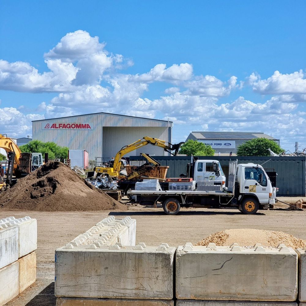 There is a Brick Walkway Leading to a Lush Green Lawn — Beehive Property Maintenance in Gemfields, QLD