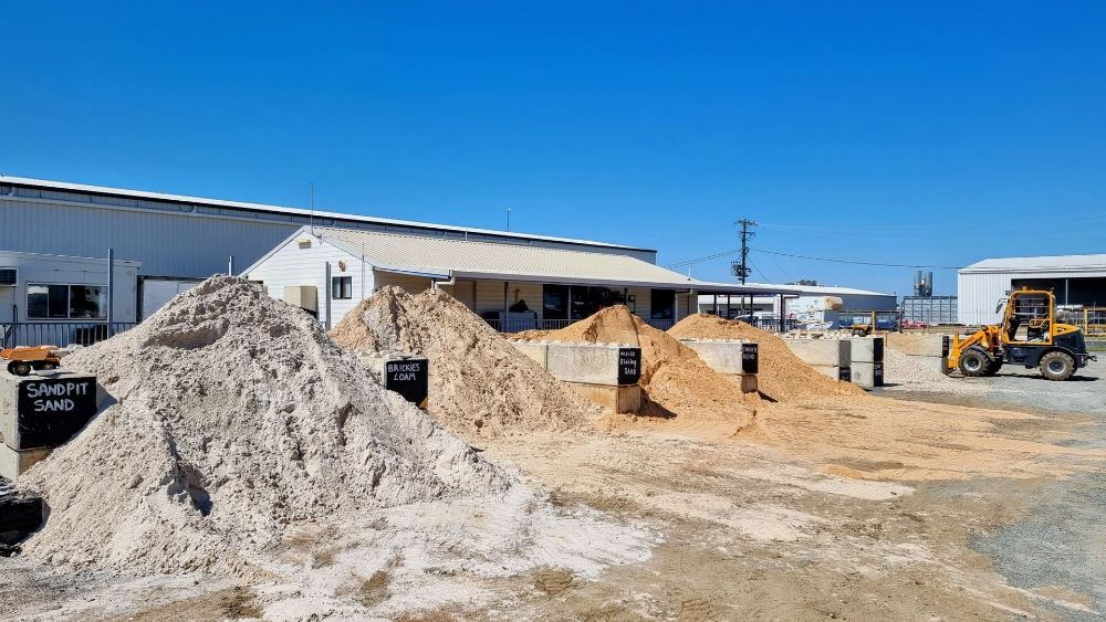 A Couple of Men Are Working on a Lawn — Beehive Property Maintenance in Clermont, QLD