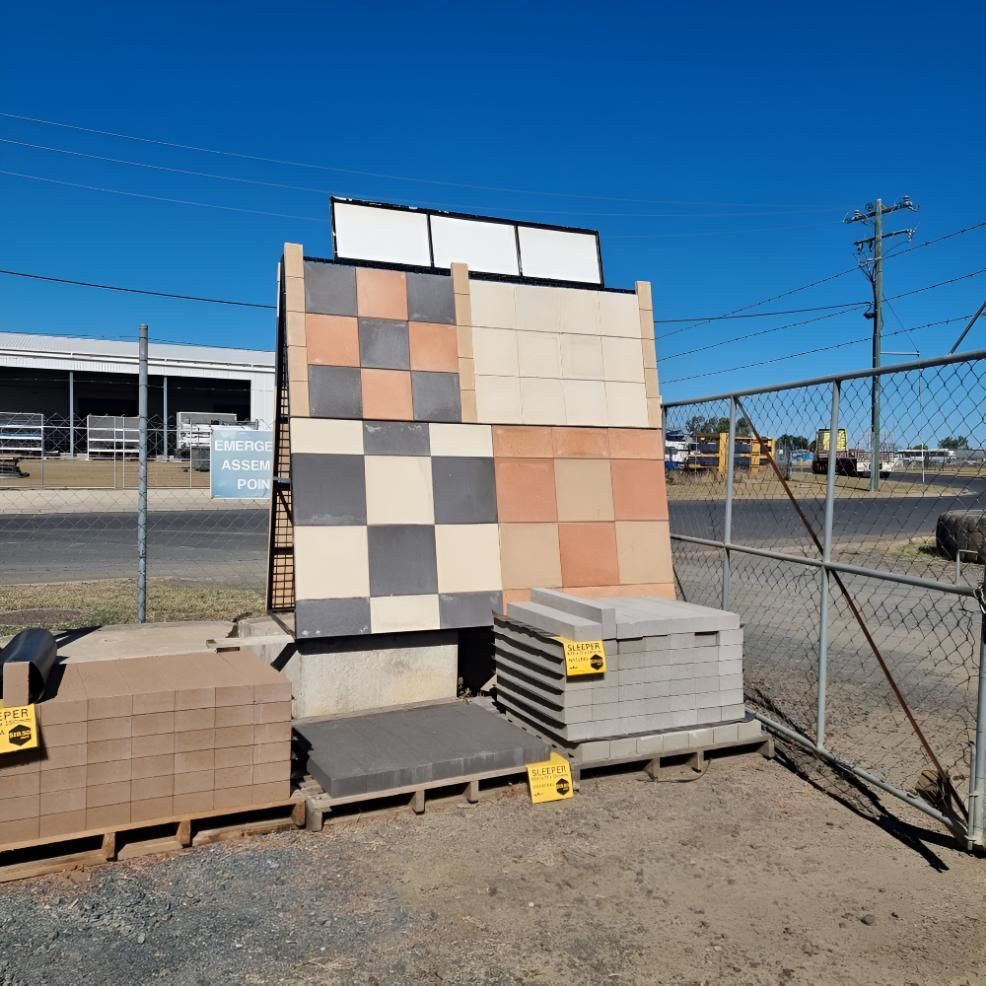 Bunch of Bricks Are Stacked on Top of Each Other — Beehive Property Maintenance in Emerald, QLD