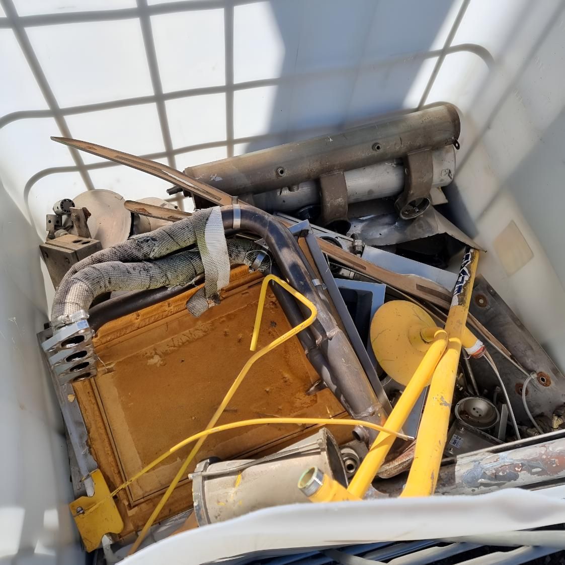 White Container Filled With a Bunch of Junk — Beehive Property Maintenance in Springsure, QLD