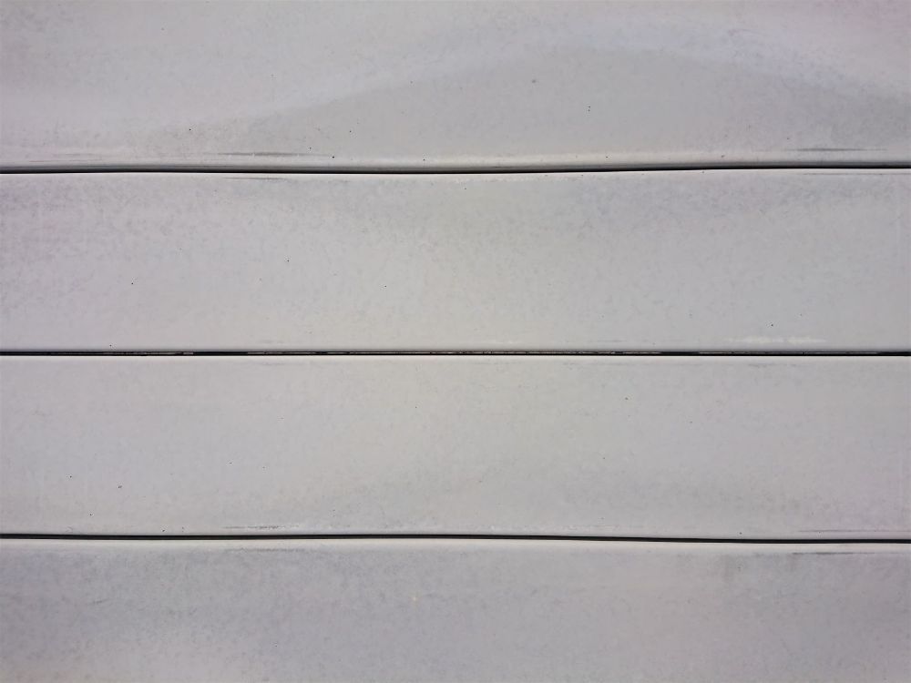 A Pile of Concrete Blocks Sitting on Top of a Wooden Pallet — Beehive Property Maintenance in Emerald, QLD