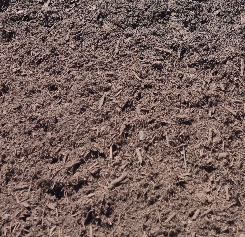 A Close Up of a Pile of Brown Soil — Beehive Property Maintenance in Emerald, QLD