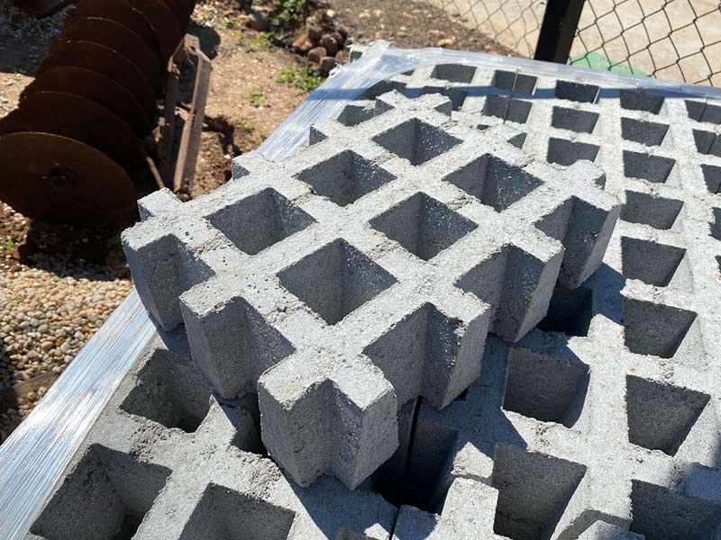 A Bunch of Concrete Blocks Are Stacked on Top of Each Other — Beehive Property Maintenance in Emerald, QLD