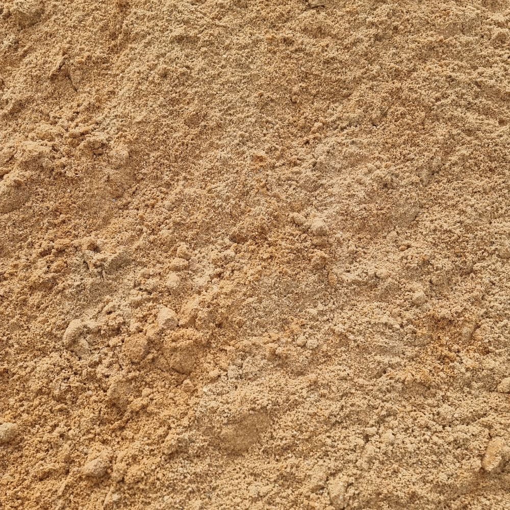 A Pile of Sand Next to a Sign That Says Washed Bedding Sand — Beehive Property Maintenance in Emerald, QLD
