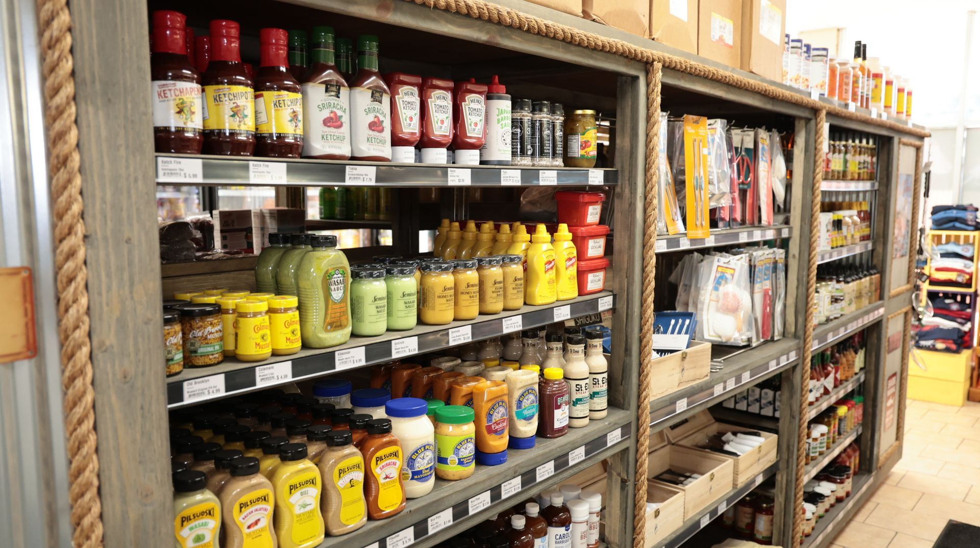 A grocery store filled with lots of condiments and sauces.