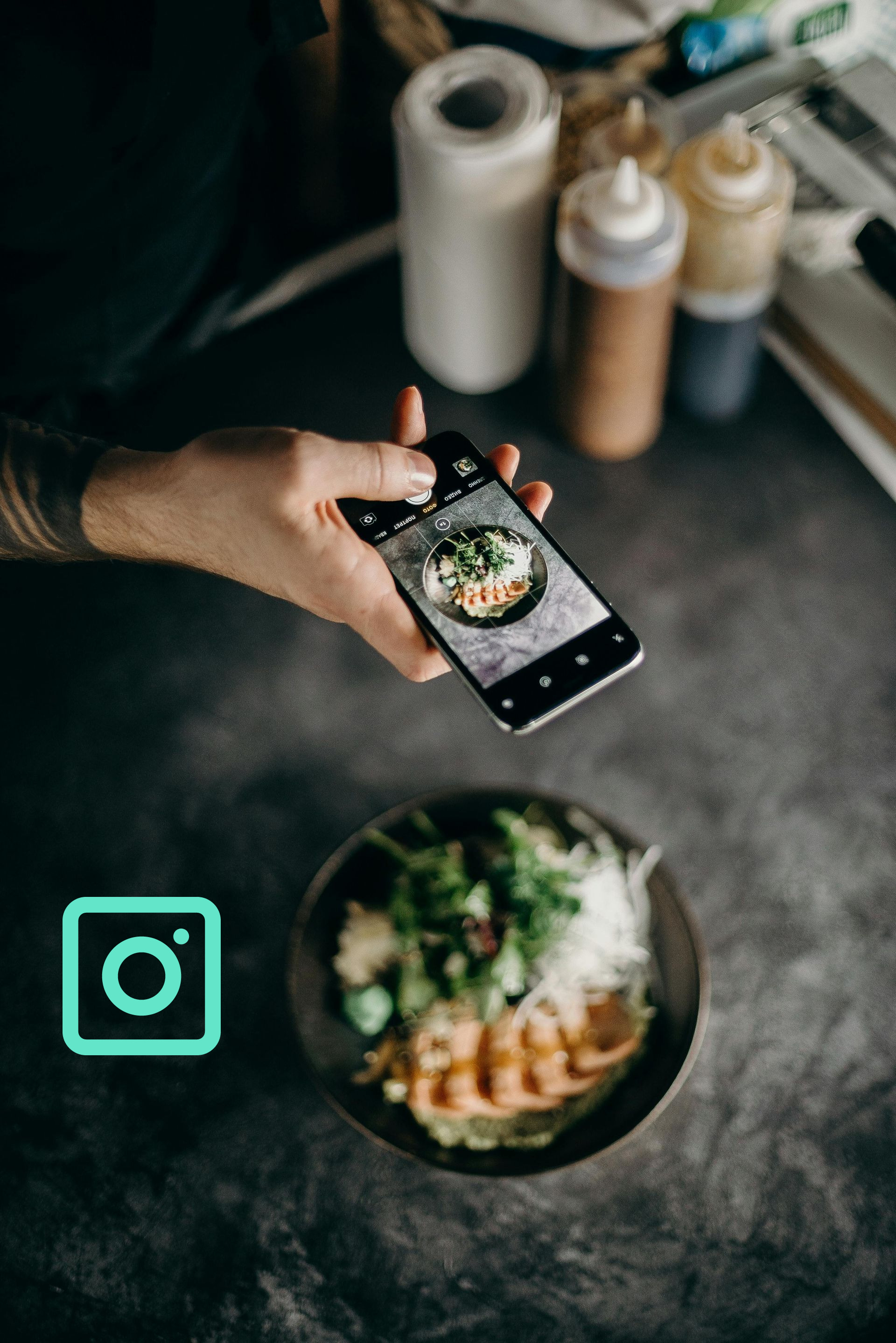 Person photographing a bowl of food with a phone, Instagram logo in corner.