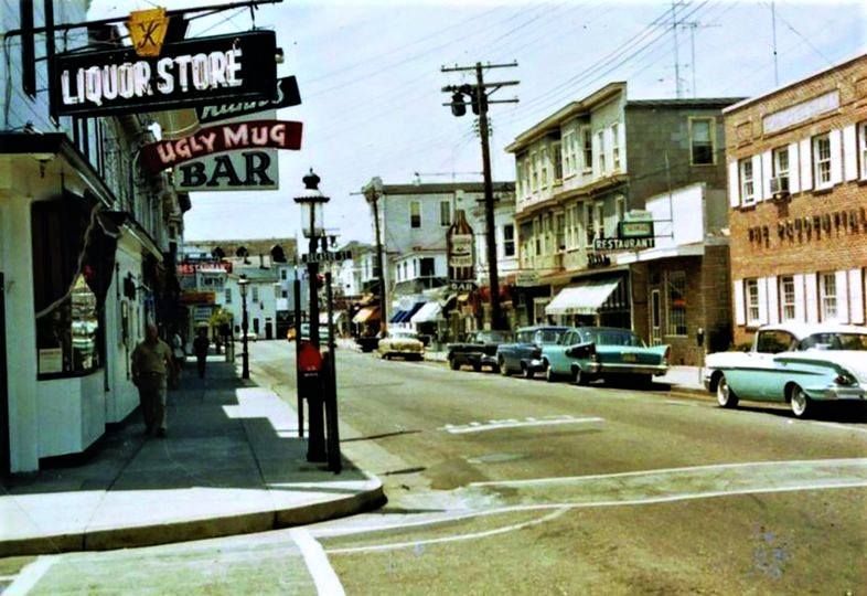 A liquor store is located on the corner of a street