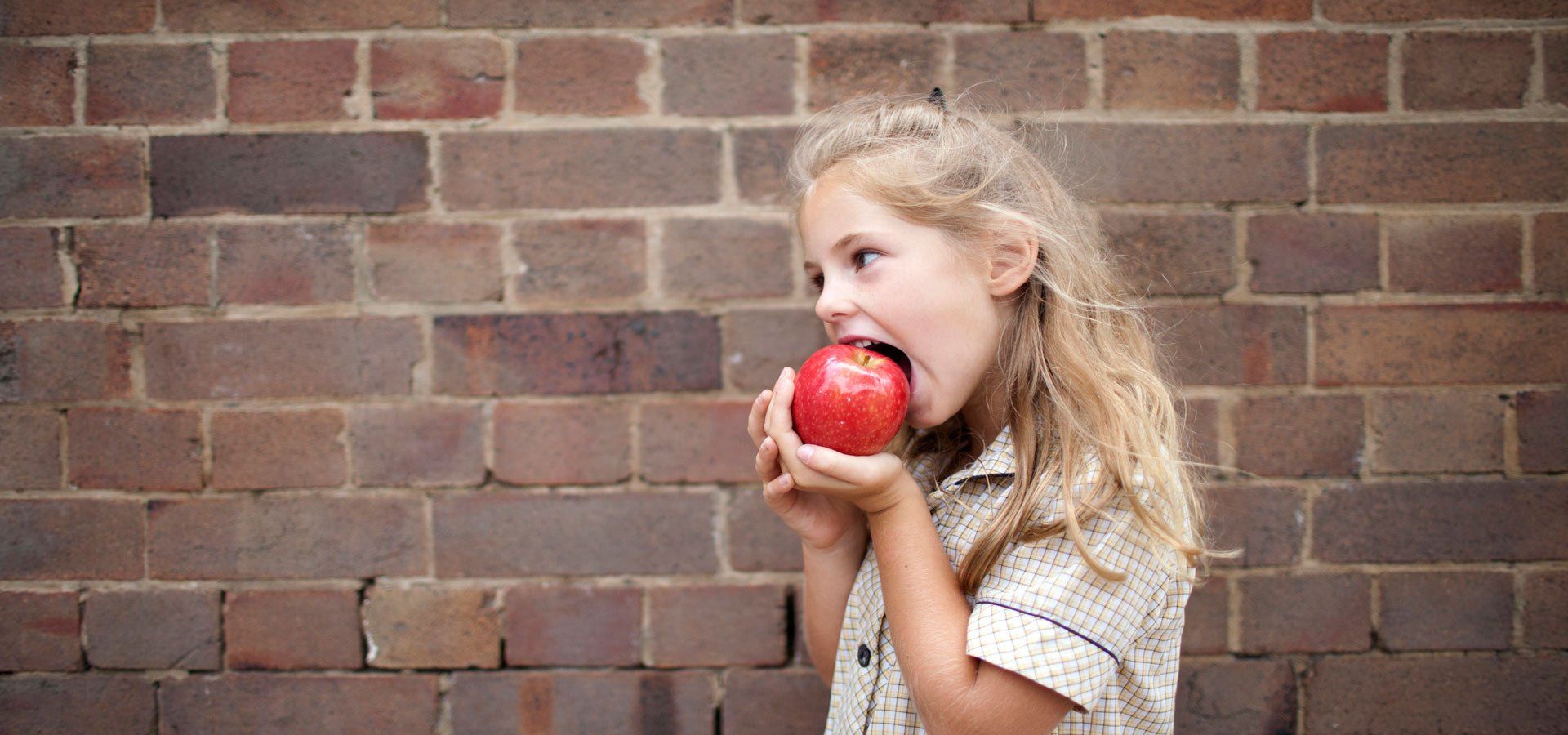 Child having an apple