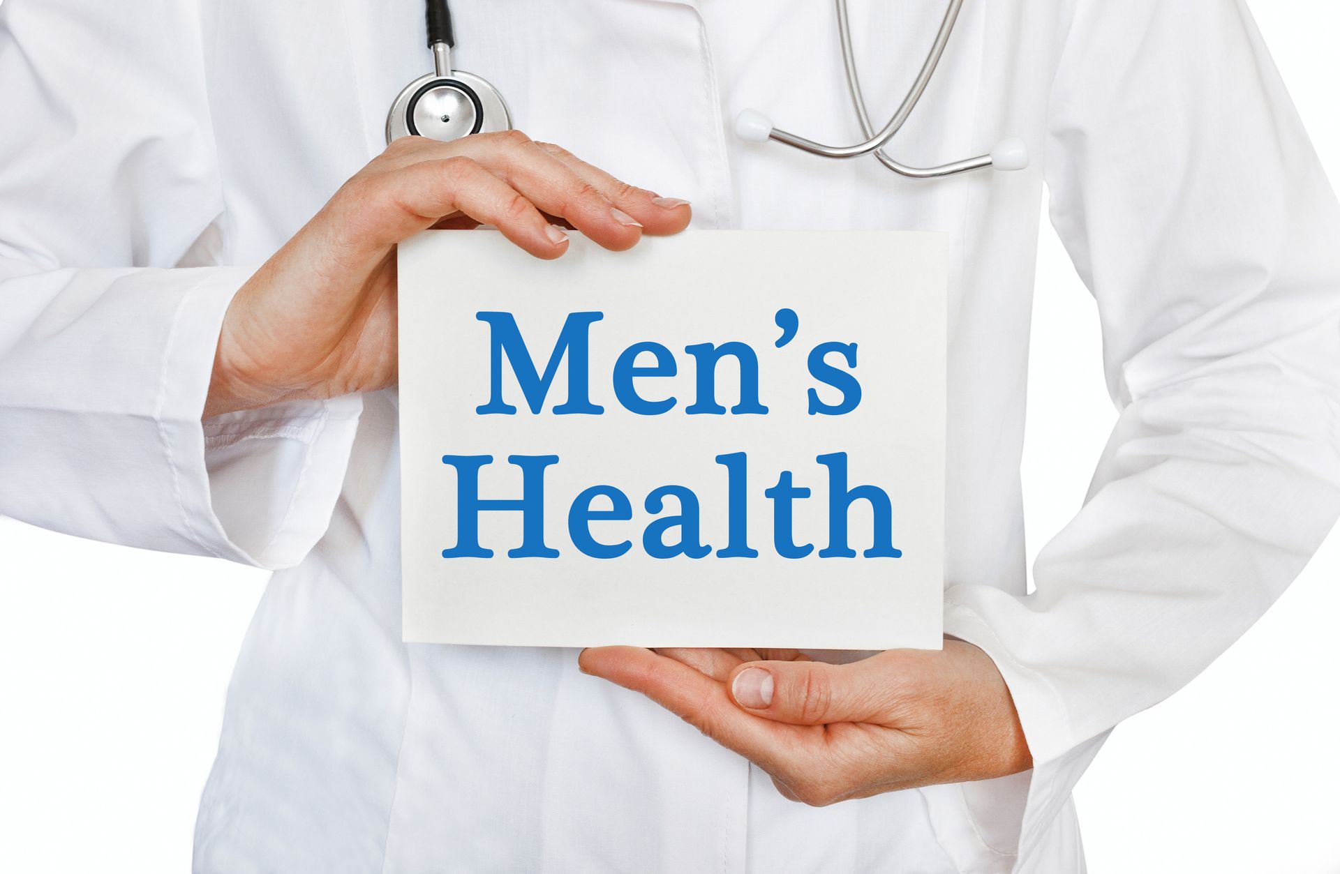  Doctor holding Men's Health card to raise awareness about prostate health and routine check-ups.