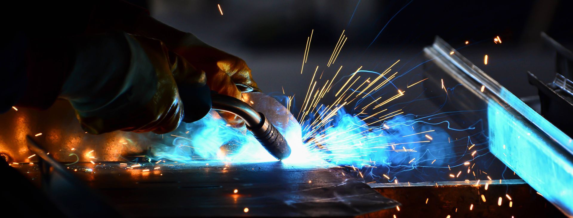 Person welding in an industrial complex near Florence, KY