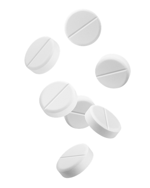 White pills with a score line are floating on a white background.