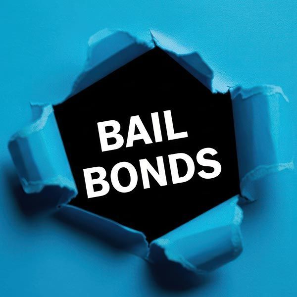 Bail Bonds text visible through a torn blue paper background.