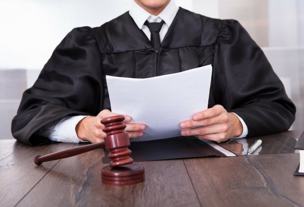 Judge Holding Papers — Fort Walton, FL — Matt McKeehan Bail Bonds