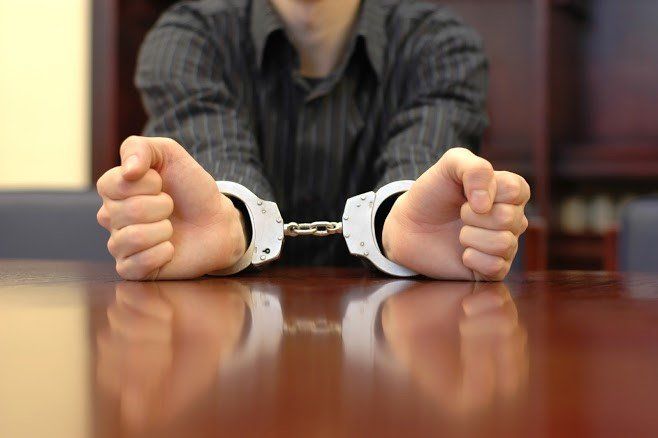 Man With Handcuffs — Pensacola, FL — Matt Mckeehan Bail Bonds