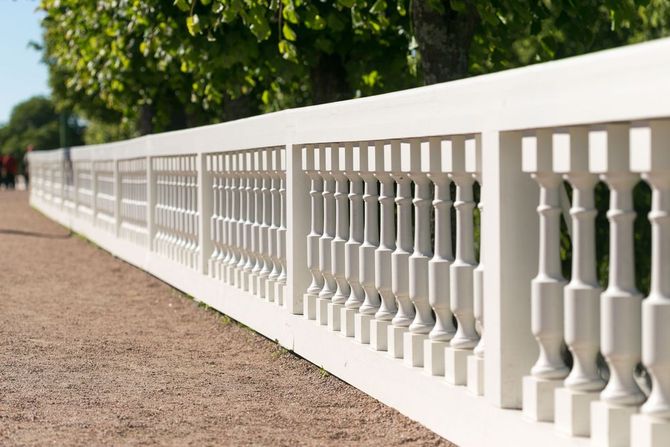 Decorative white concrete balustrade fence.