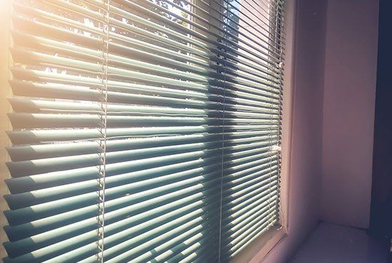Sunlight Coming Through Venetian Blinds — Abode Shutters & Blinds In Taree South NSW