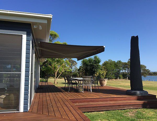 Motorised Folding Arm Awning — Abode Shutters & Blinds In Taree South NSW