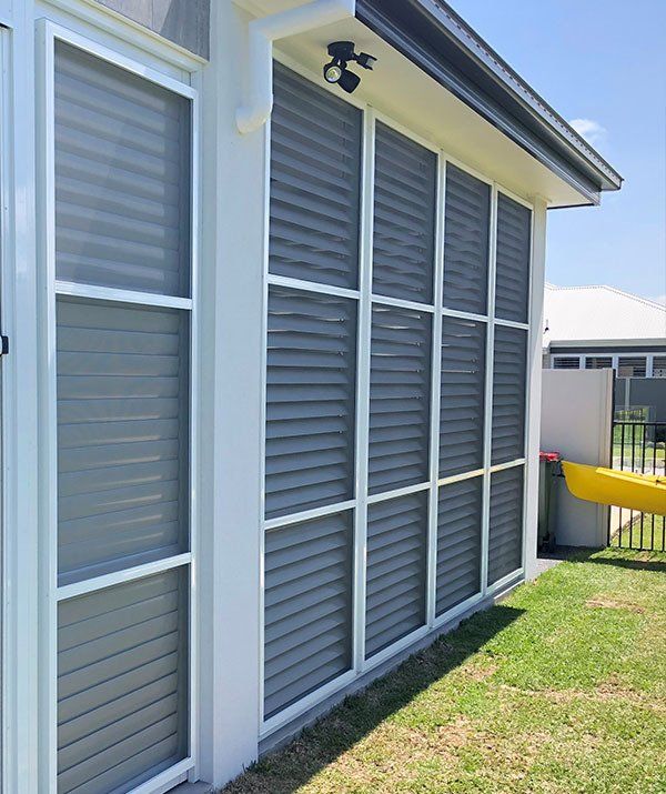 Outdoor window Shutter Blinds — Abode Shutters & Blinds In Taree South NSW