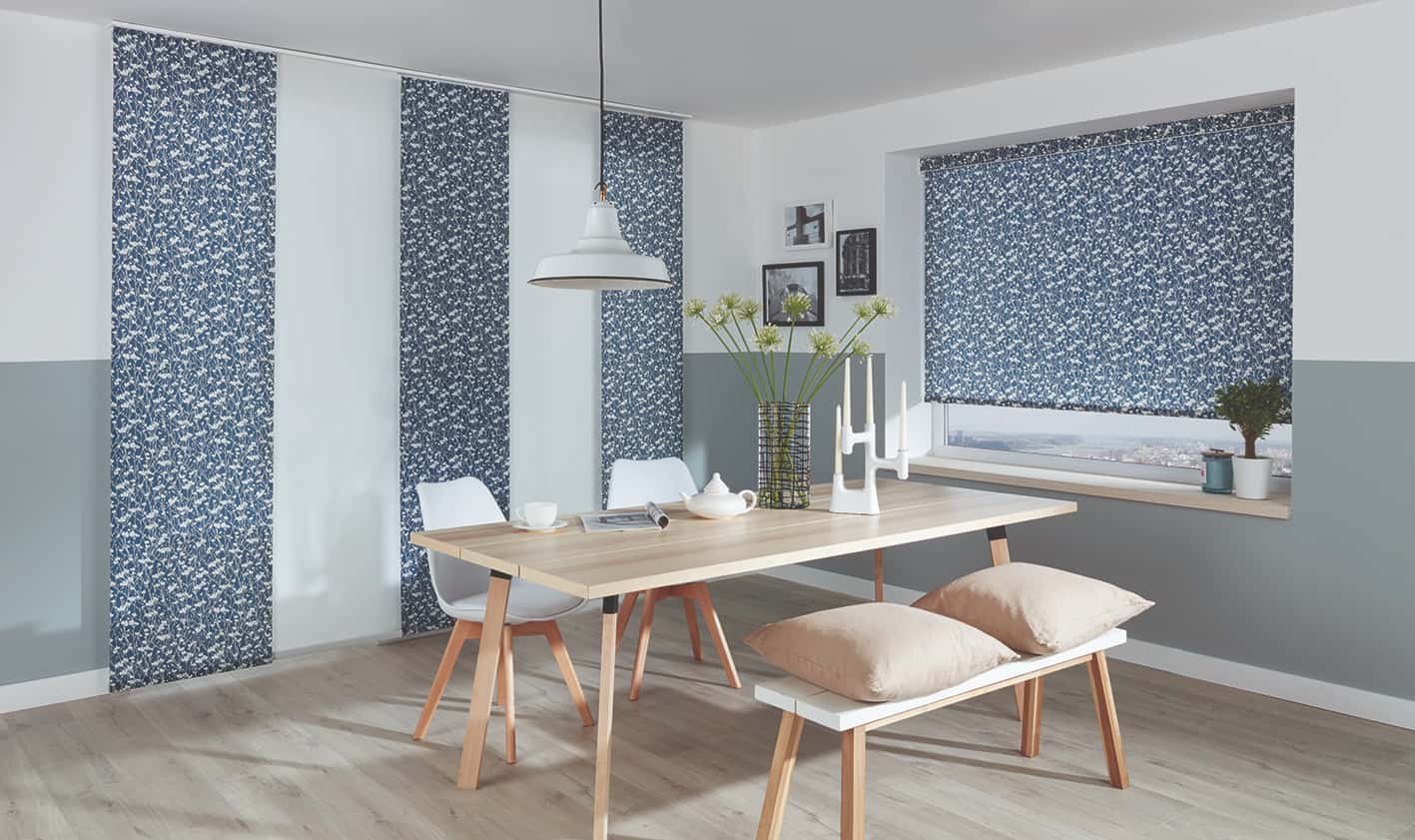 A Dining Room With a Table and Chairs and a Bench — Abode Shutters & Blinds In Taree South, NSW