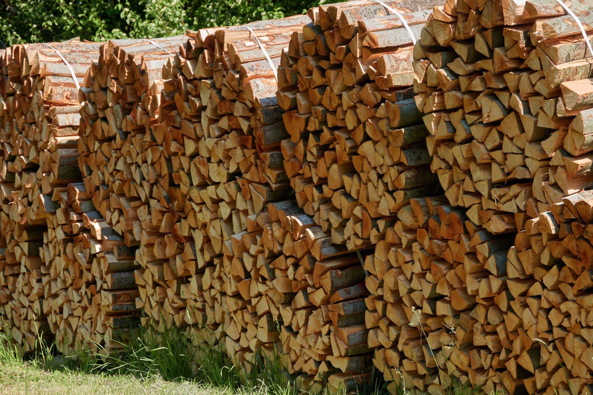 Round Bales of Brown Firewood — Williamsburg, VA — Top Notch Tree Service
