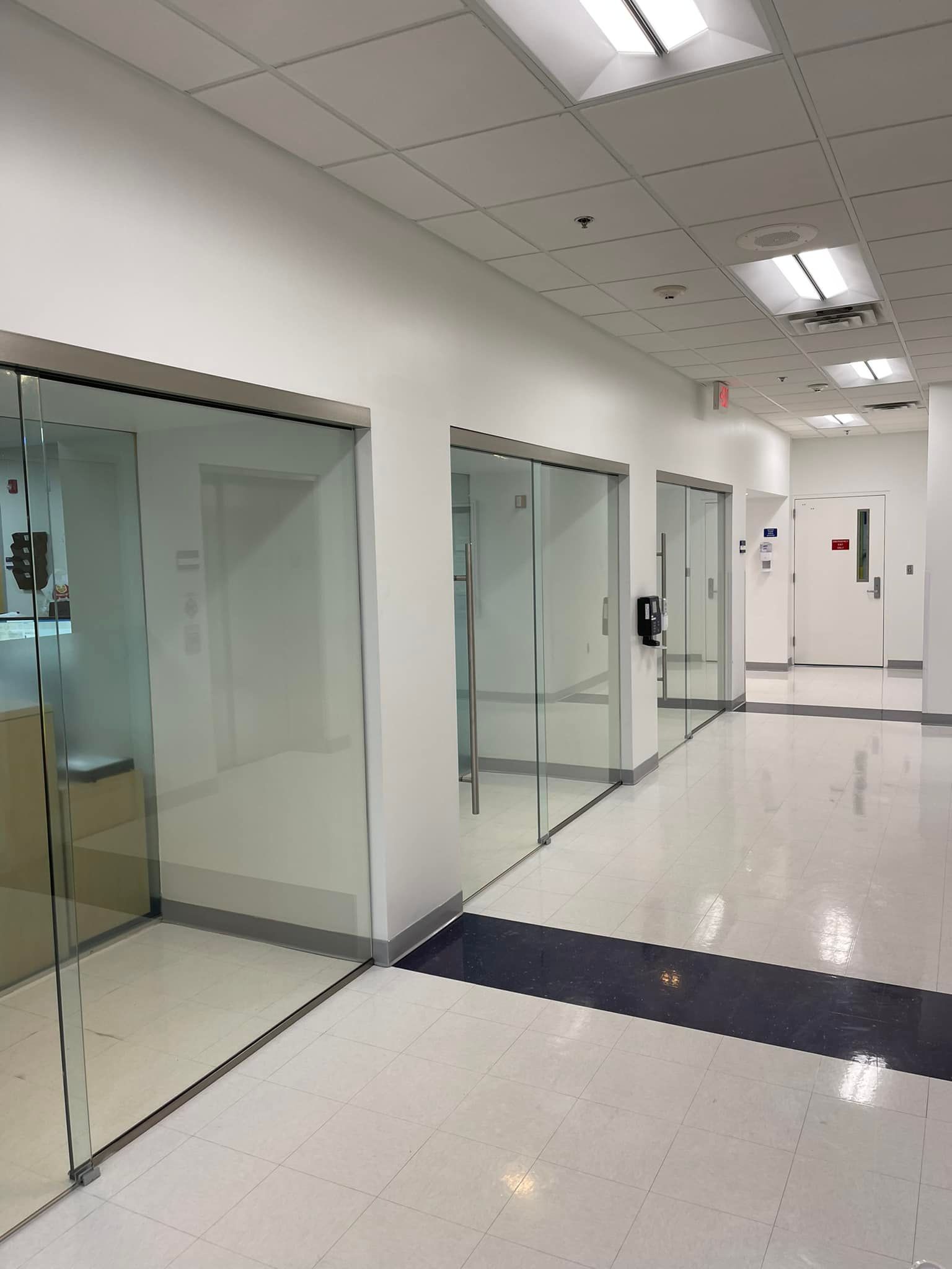 A Hallway with Sliding Glass Doors | Clayton, NC | Clayton Glass & Mirror