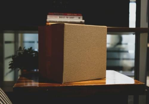 An unlabeled package ordered from an online source.