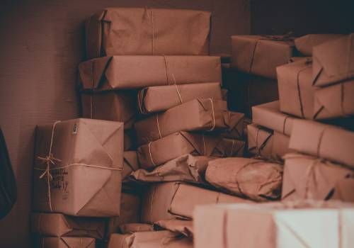 Several parcels and packages in a dark room.