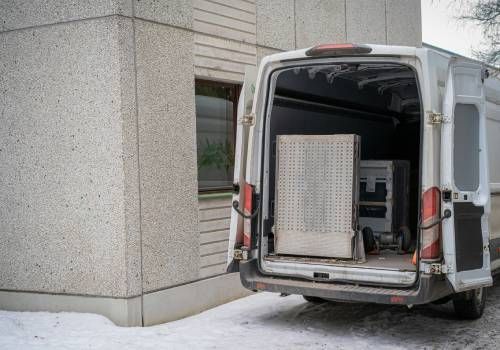 A van with open doors finishing a Same-Day Moving.