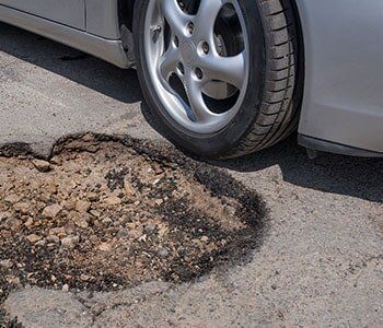 Pothole Avoidance — Riverside, CA — Jerl's Muffler & Brake