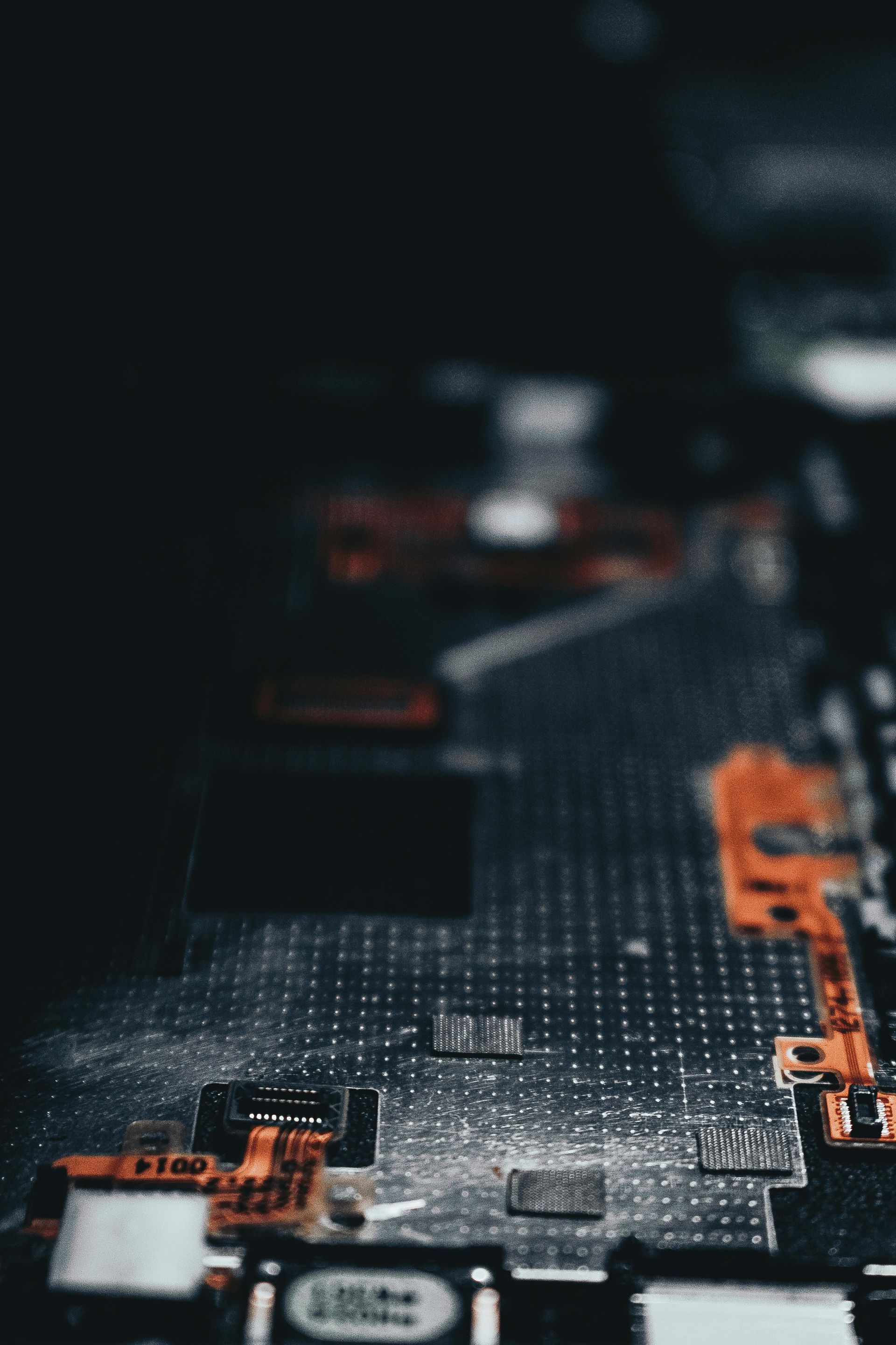 A close up of a motherboard with a lot of electronic components on it.
