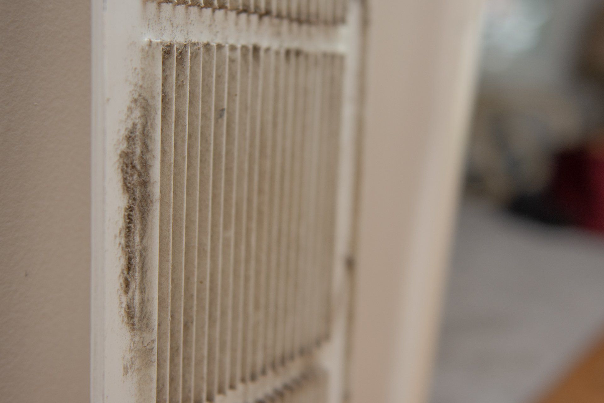 Dirty air vent with visible mold on the side.