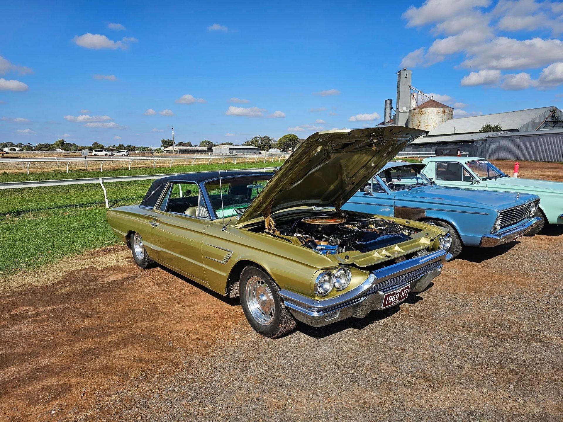car parked with bonnet up 
