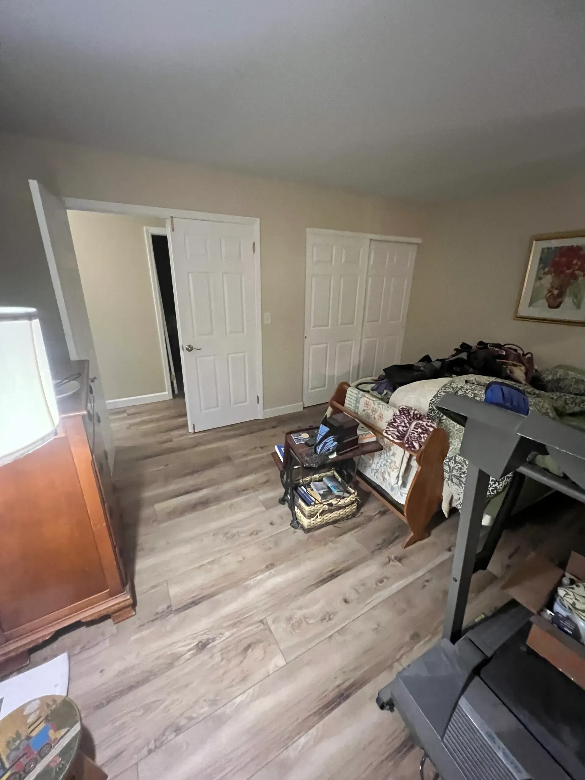 There is a treadmill in the middle of the room.