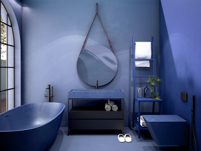 A bathroom with blue walls , a bathtub , a sink and a mirror